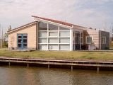 Workum holiday bungalow rental - Waterfront home in Friesland, Netherlands