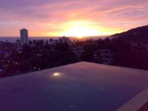 Sunset over rooftop pool