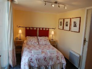 One of the master bedrooms