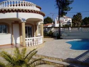 Pool is in front of the villa