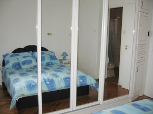 Wardrobe with mirror doors