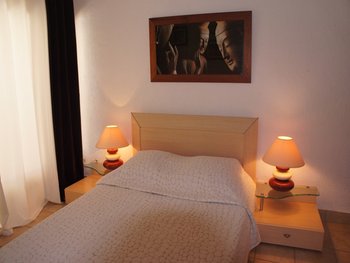 ONE OF THE THREE BEDROOMS