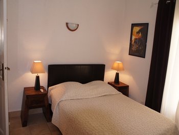 ONE OF THE THREE BEDROOMS