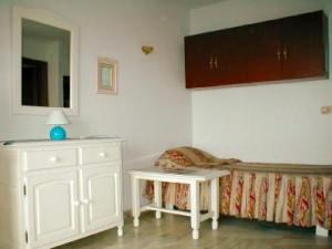 living area with bed