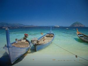 Longtails at Rawai Beach.