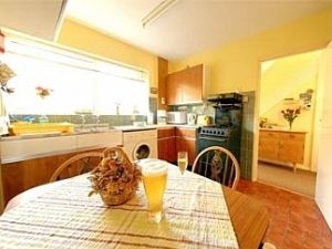 Kitchen has dining table