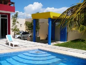 Pool area with sunbeds