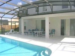 Pool has covered lanai