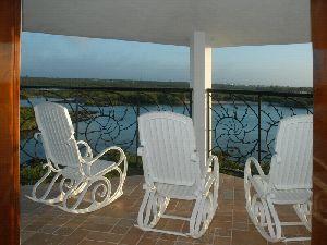 High balcony over lagoon/ocean