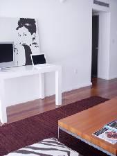 Table with TV, dbls as desk