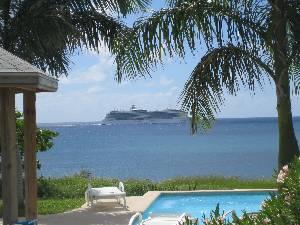 cruise ship passing the pool
