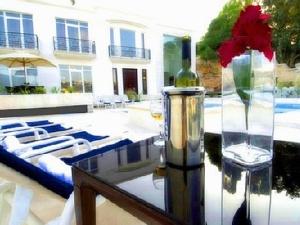 Sample Malta wine by the pool