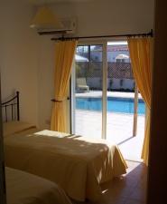 One of the twin rooms