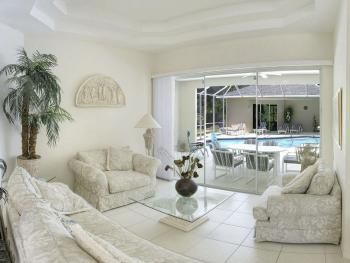 Living room leads on to pool