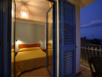 BEDROOM WITH BALCONY