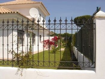 Front of villa and side garden