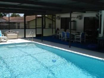 Pool has lanai for privacy