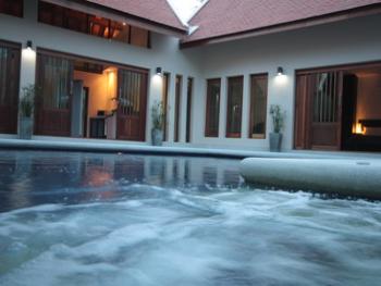 Pool and jacuzzi at night