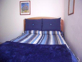 Double bed in triple room