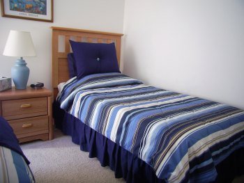 Single bed in triple bedroom