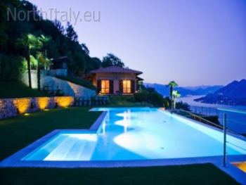 Villa and pool at night