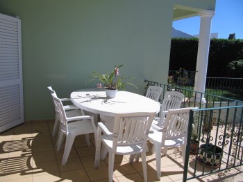 Dining area by the pool and bb