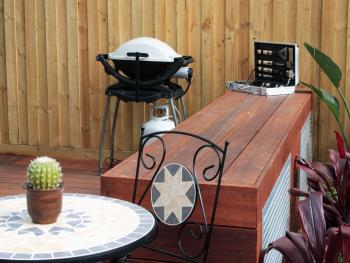 BBQ with filled gas bottle