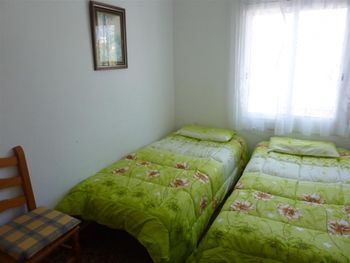Casa Rosales twin bedrooms