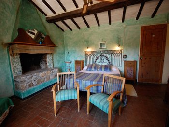 double bedroom with fireplace