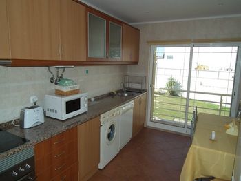 Kitchen and balcony to garden