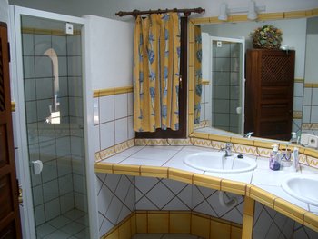 One of three bathrooms